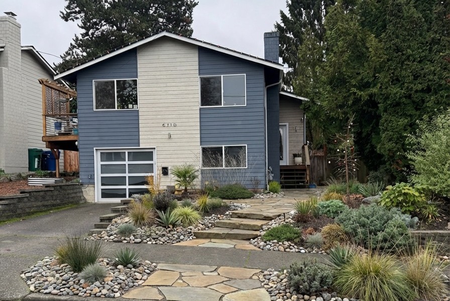 Xeriscape landscaping renovation with flagstone pathway and drought-tolerant native plantings